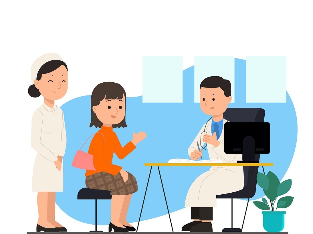 Arzt mit Patientin im Gespräch